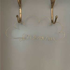Metal “dream” sign for baby room